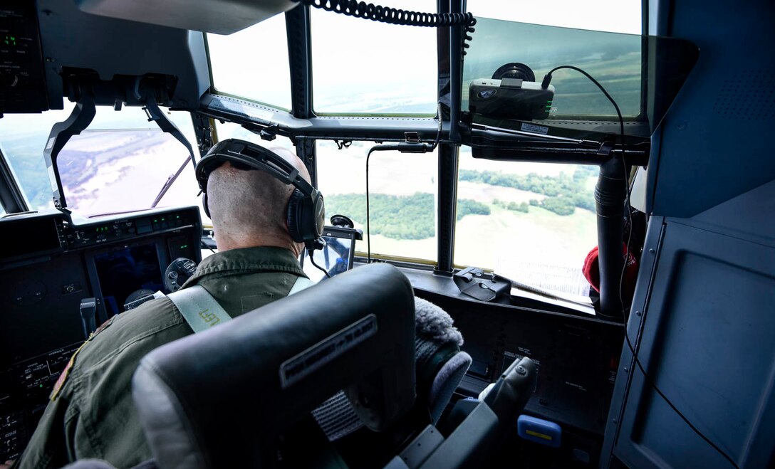 Maj. Seth Lake, 327th Airlift Squadron pilot, and Maj. Maj. Matthew Heisel, 327th Airlift Squadron pilot, participate in a training flight to enhance readiness on August 3, 2019, at Little Rock Air Force Base, Ark. Mobility aircraft, such as the C-130J, deliver critical personnel and cargo and provide airdrop of time-sensitive supplies, food and ammunition on a global scale with a critical part of the airlift capabilities being the efforts of the maintenance personnel who ensure the workhorse of the mobility for, the C-130, is always ready, always there! (U.S. Air Force photo by Senior Airman Nathan Byrnes)