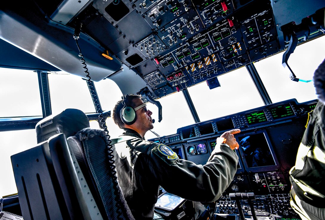 Maj. Seth Lake, 327th Airlift Squadron pilot, and Maj. Matthew Heisel, 327th Airlift Squadron pilot, participate in a training flight to enhance readiness on August 3, 2019, at Little Rock Air Force Base, Ark. The majority of our Reserve members have to meet the same requirements of Active Duty personnel. This means they have to balance a fulltime civilian job or college studies while maintaining their military readiness. The airspace, terrain, drop zones, landing zones, and local airports here in Arkansas are excellent venues for training and the relationship the base has with Arkansas affords the resources to execute the mission. (U.S. Air Force photo by Senior Airman Nathan Byrnes)