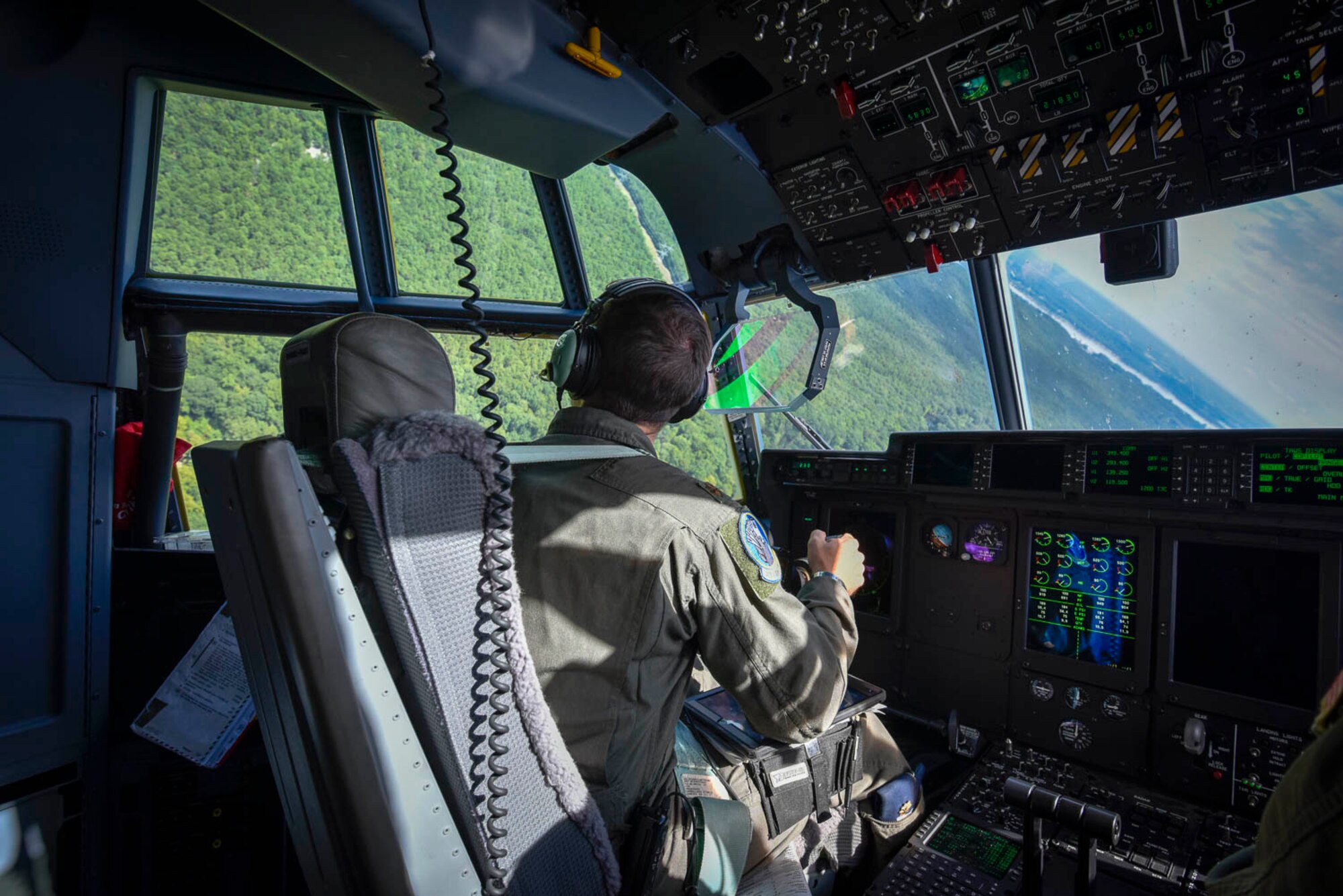 Maj. Seth Lake, 327th Airlift Squadron pilot participates in a training flight to enhance readiness on August 3, 2019, at Little Rock Air Force Base, Ark. The majority of our Reserve members have to meet the same requirements of Active Duty personnel. This means they have to balance a fulltime civilian job or college studies while maintaining their military readiness. The airspace, terrain, drop zones, landing zones, and local airports here in Arkansas are excellent venues for training and the relationship the base has with Arkansas affords the resources to execute the mission. (U.S. Air Force photo by Senior Airman Nathan Byrnes)