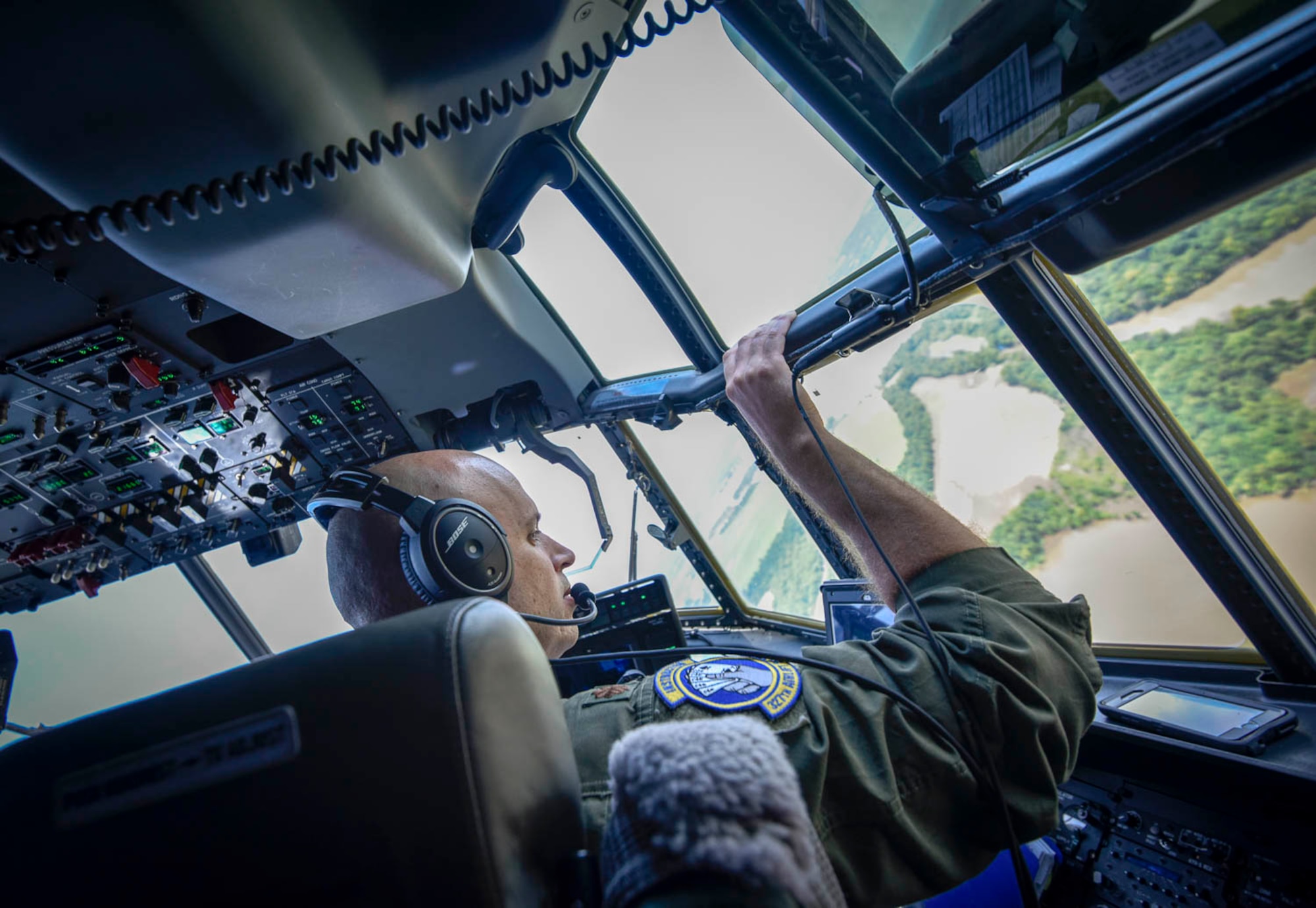 Maj. Maj. Matthew Heisel, 327th Airlift Squadron pilot, participate in a training flight to enhance readiness on August 3, 2019, at Little Rock Air Force Base, Ark. The C-130 is a versatile aircraft that can be used for several different missions and the success of the mission depends upon teamwork and Airmen’s resiliency and their ability to overcome adversity. (U.S. Air Force photo by Senior Airman Nathan Byrnes)