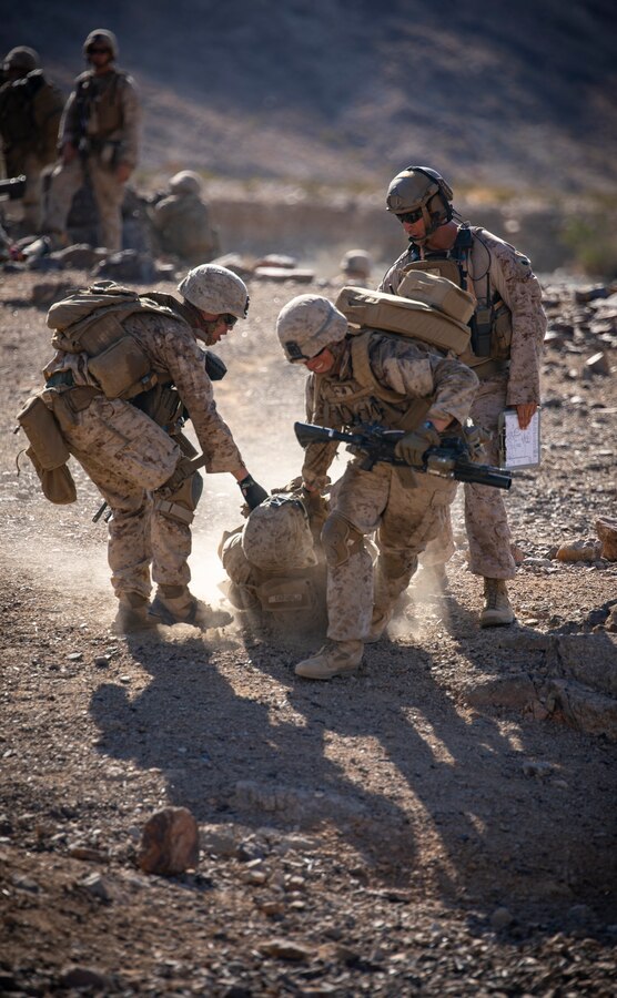 U.S. Marines with 1st Battalion, 25th Marine Regiment, 4th Marine Division, drag a simulated casualty in Range 400 at Marine Corps Air Ground Combat Center Twentynine Palms, Calif., Aug. 5, 2019, during Integrated Training Exercise 5-19. After ITX 5-19, 1st Battalion, 25th Marine Regiment will be activated and deploy to the Indo-Pacific Command to conduct multiple exercises across the region. ITX measures the unit’s ability to provide a cohesive, trained, and ready capability in support of service and Combatant Commander requirements.  (U.S. Marine Corps photo by Sgt. Andy O. Martinez)