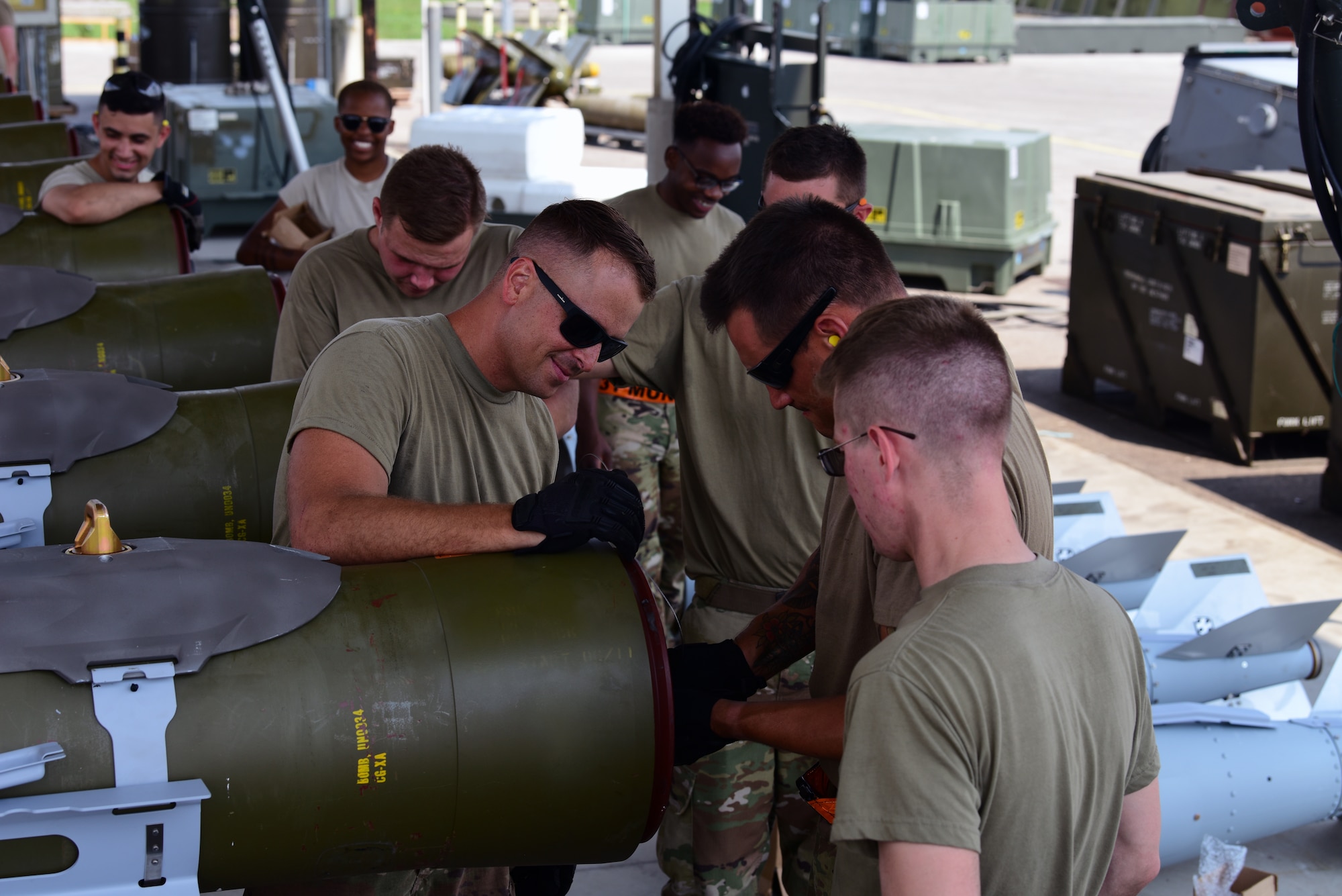 Airmen work to build munitions during CAPEX 2019 Aug. 6, 2019, at Aviano Air Base, Italy. Airmen are able to learn and enhance their skills during exercises allowing for improved combat readiness. (U.S. Air Force photo by Airman 1st Class Caleb House)