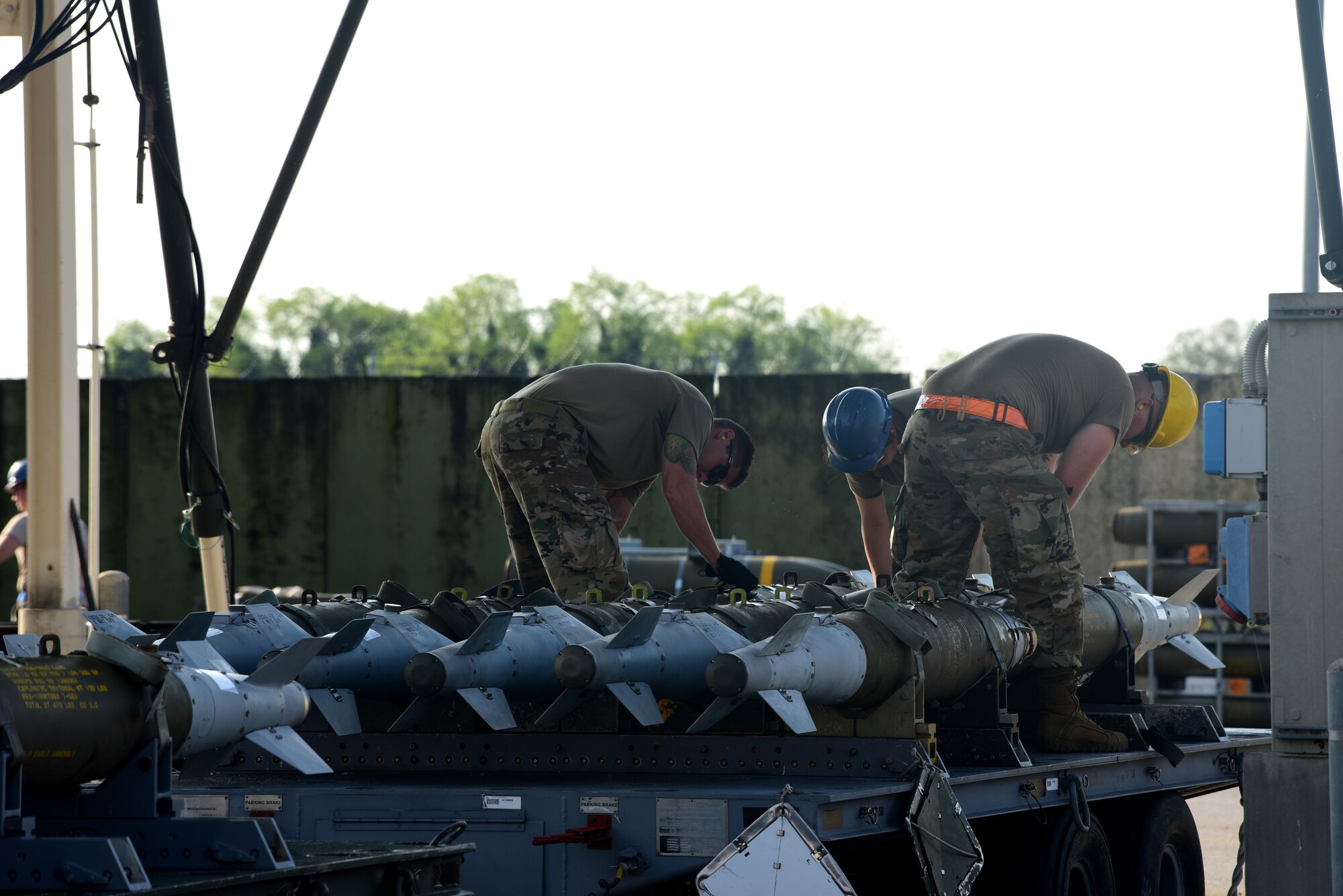 Airmen inspect munitions during Combat Ammunition Production Exercise 2019 on Aug. 7, 2019, at Aviano Air Base, Italy. Conducting exercises such as CAPEX enables Airmen to learn in a controlled environment, bolstering unit interoperability and refining their practice. (U.S. Air Force photo by Airman 1st Class Caleb House)
