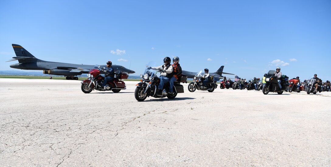 Motorcycles depart the flight line at Ellsworth Air Force Base, S.D., Aug. 6, 2019. Motorcyclists participating in the 19th annual Dakota Thunder Run rode from the base and through Vanocker Canyon to Sturgis to enjoy the rally and the 19th annual Veteran’s Appreciation Ceremony. (U.S. Air Force photo by Senior Airman Thomas Karol)