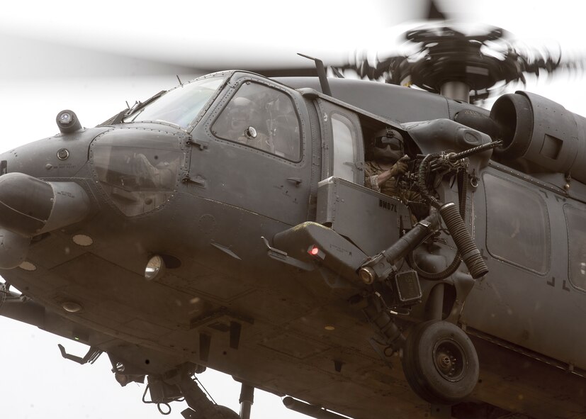 The crew of a U.S. Air Force HH-60G Pave Hawk assigned to the 55th Rescue Squadron prepare to evacuate an isolated person during exercise Red Flag-Rescue 19-1 near Davis-Monthan Air Force Base, Arizona, May 9, 2019.   Red Flag-Rescue gives joint service personnel an opportunity to build fundamental combat search and rescue skills to fight in and out of contested environments.  (U.S. Air Force photo by Airman 1st Class Duncan C. Bevan)