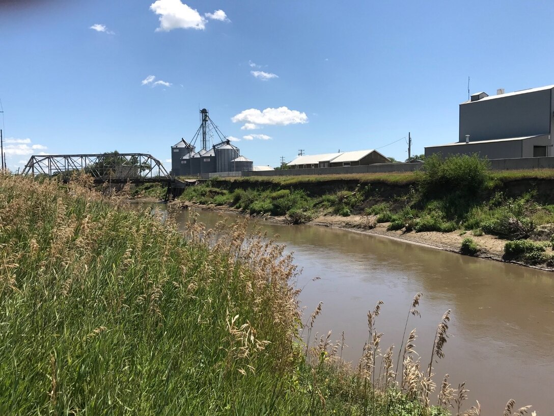 Photo of the Pender levee bank erosion and bridge structure damage from the March high water event.  Photo taken during the July 29, 2019 site visit.