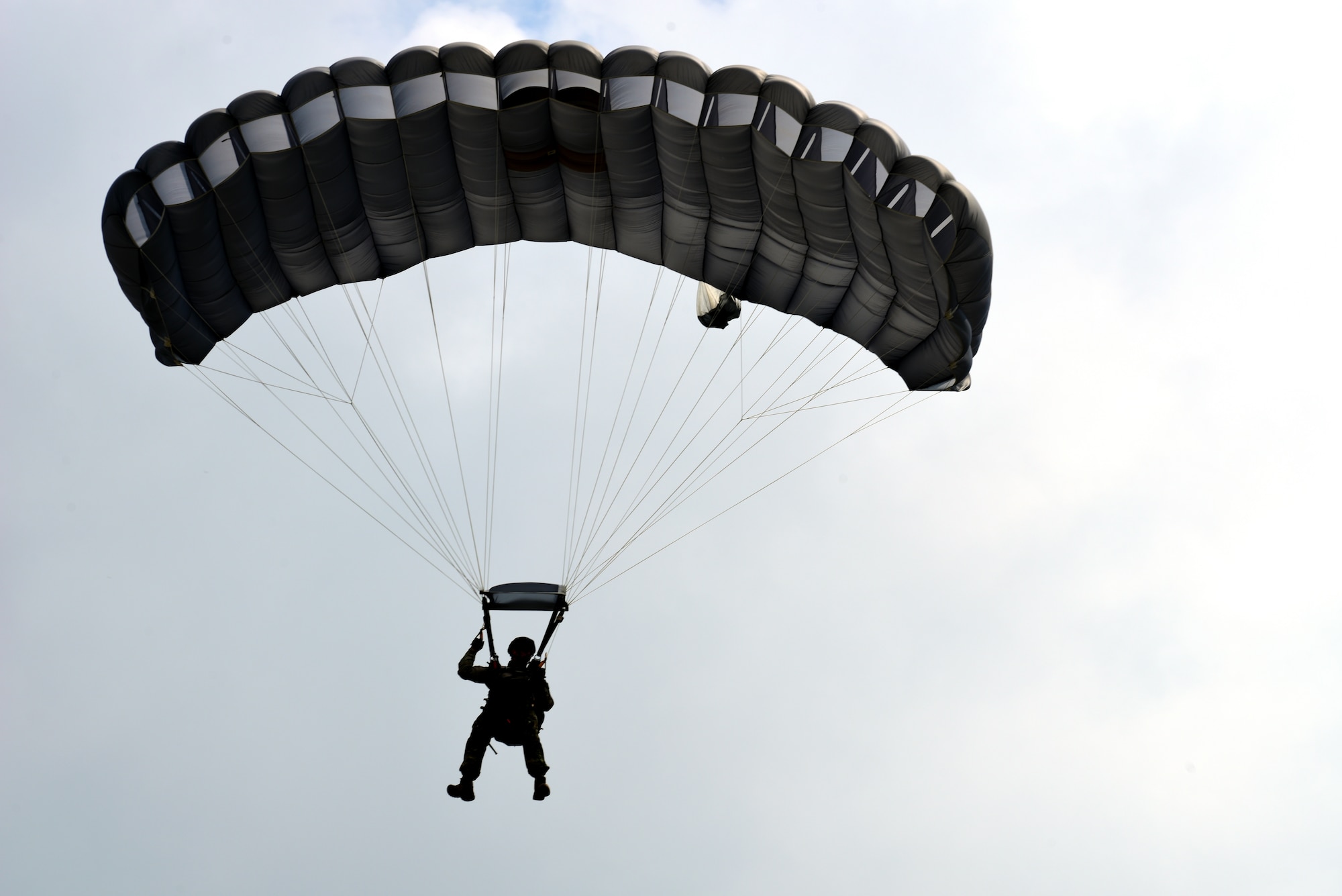 An Airman parachutes onto the airfield at Aviano Air Base, Italy, May 3, 2019. (U.S. Air Force photo by Airman 1st Class Caleb House)