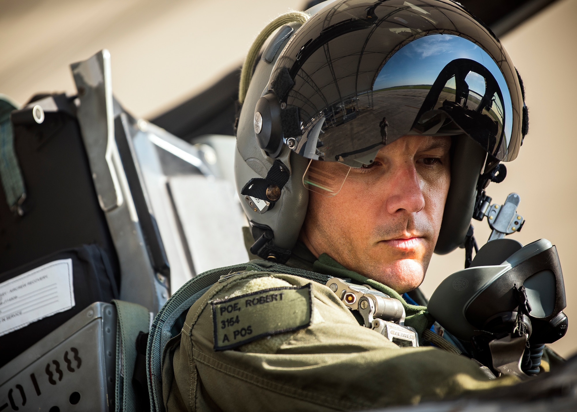 Capt. Robert Poe, 74th Fighter Squadron chief of safety and A-10C Thunderbolt II pilot, sits in the cockpit of an A-10, June 28, 2019, at Moody Air Force Base, Ga. Poe is one of the few Airmen who have earned three different aviation badges. During his 15-year career, Poe earned his enlisted aircrew wings as a boom operator for KC-135 Stratotankers, then commissioned as a navigator for the U-28A aircraft and earned his combat systems officer badge. In 2013 he cross-trained to earn his pilot wings and become an A-10 pilot. (U.S. Air Force photo by Airman 1st Class Eugene Oliver)
