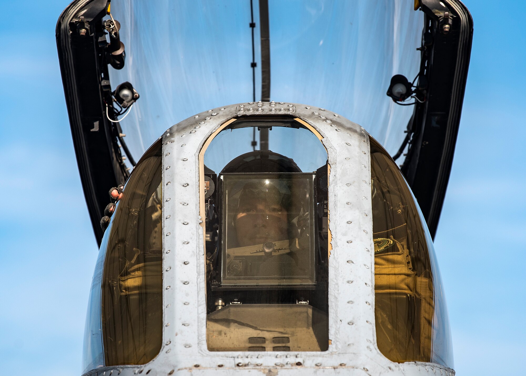 Capt. Robert Poe, 74th Fighter Squadron chief of safety and A-10C Thunderbolt II pilot, sits in the cockpit of an A-10, June 28, 2019, at Moody Air Force Base, Ga. Poe is one of the few Airmen who have earned three different aviation badges. During his 15-year career, Poe earned his enlisted aircrew wings as a boom operator for KC-135 Stratotankers, then commissioned as a navigator for the U-28A aircraft and earned his combat systems officer badge. In 2013 he cross-trained to earn his pilot wings and become an A-10 pilot. (U.S. Air Force photo by Airman 1st Class Eugene Oliver)