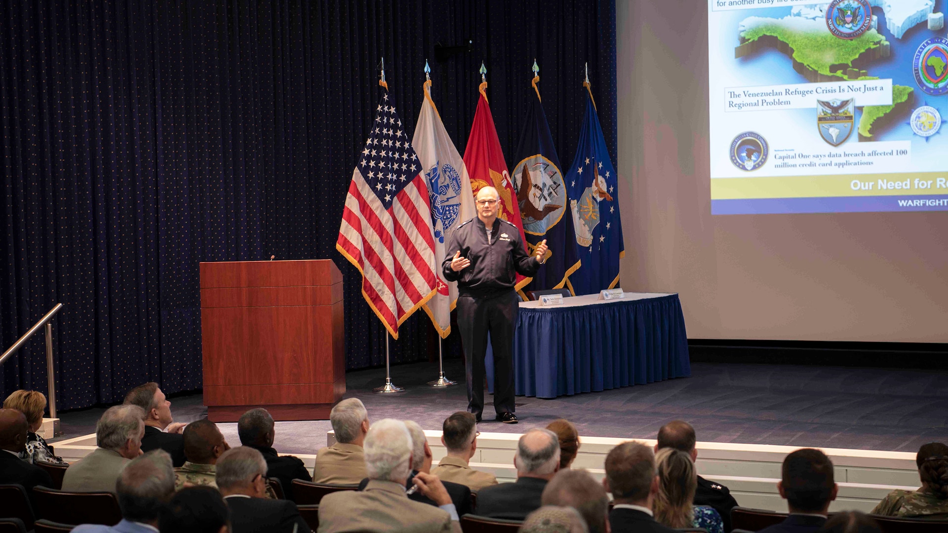 Air Force Maj. Gen. Allan Day, DLA Logistics Operations director, describes how DLA uses automated systems and daily contact with warfighters to forecast future demands July 31 at DLA Industry Day at the McNamara Headquarters Complex on Fort Belvoir, Virginia.