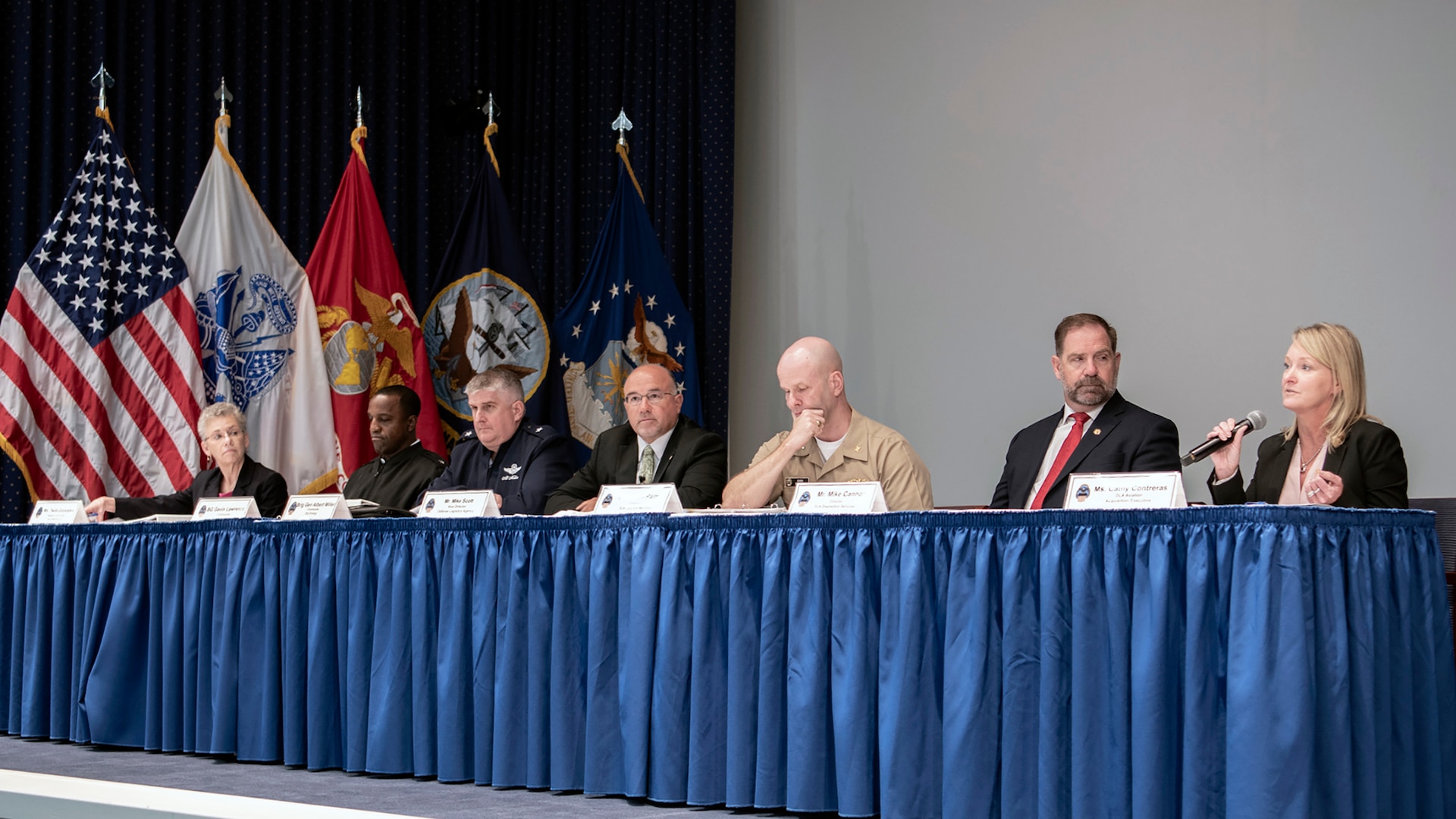 DLA Deputy Director Mike Scott (middle) and senior leaders from the agency’s major subordinate commands describe current trends and future demands for each supply chain July 31 at DLA Industry Day at the McNamara Headquarters Complex on Fort Belvoir, Virginia.