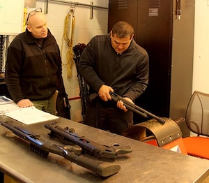 A training exercise on weapon breakdown.