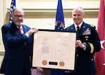 JOINT BASE ANACOSTIA-BOLLING, D.C. (July 31, 2019) Retired Lt. Gen. Patrick Hughes, serving as the Office of Strategic Service Society Representative, presenting the OSS Congressional Gold Medal to DIA Director Lt. Gen. Robert P. Ashley Jr. (DIA photo by David Richards/Released)