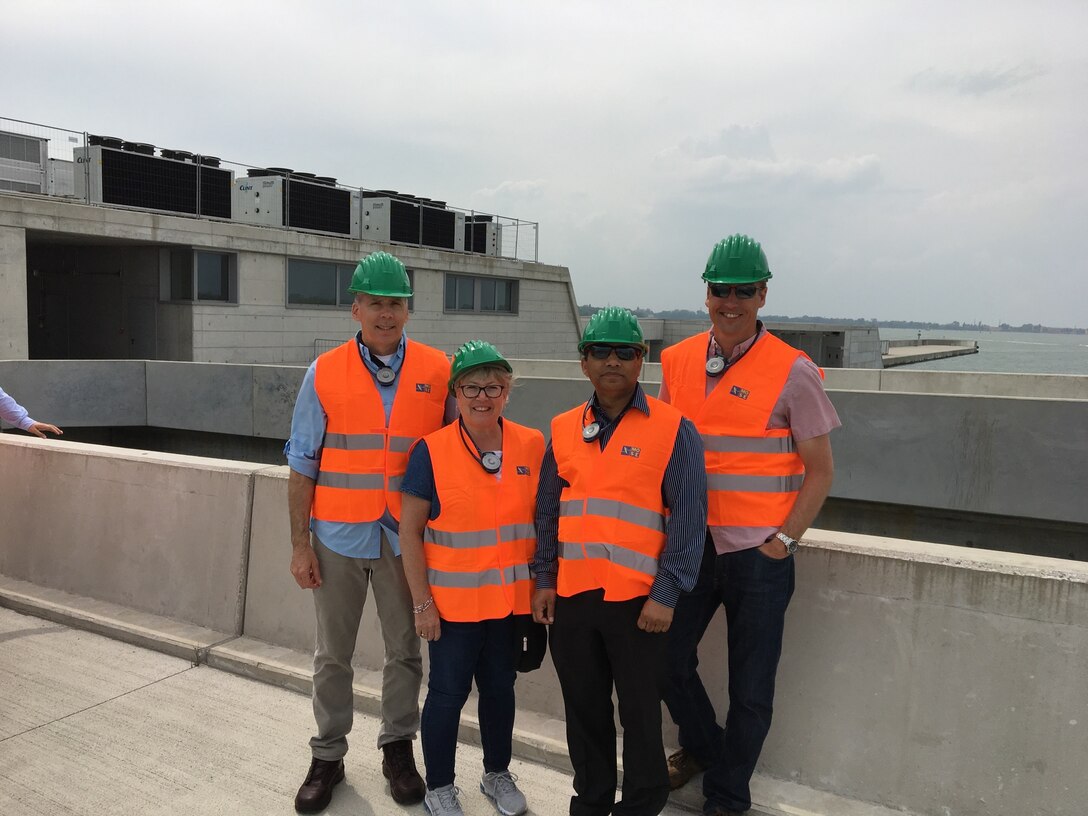 VENICE, Italy (June 6, 2019)—During the Annual Meeting of the I-STORM Network on June 6-7 2019 in Venice Italy members of the Project Management team for the Coastal Texas Protection and Restoration Feasibility Study at USACE Galveston District tour the MOSE Barrier at Lido Barrier Inlet, a system of mobile gates installed at the lagoon inlets that are able to temporarily isolate the Venetian lagoon from the Adriatic Sea during severe storm surge events, thus ensuring acceptable safeguarding water levels. (left to right)Tom Smith, Sharon Tirpak, Himangshu Das, and John Winkelman. (Photo provided by Sharon Tirpak)