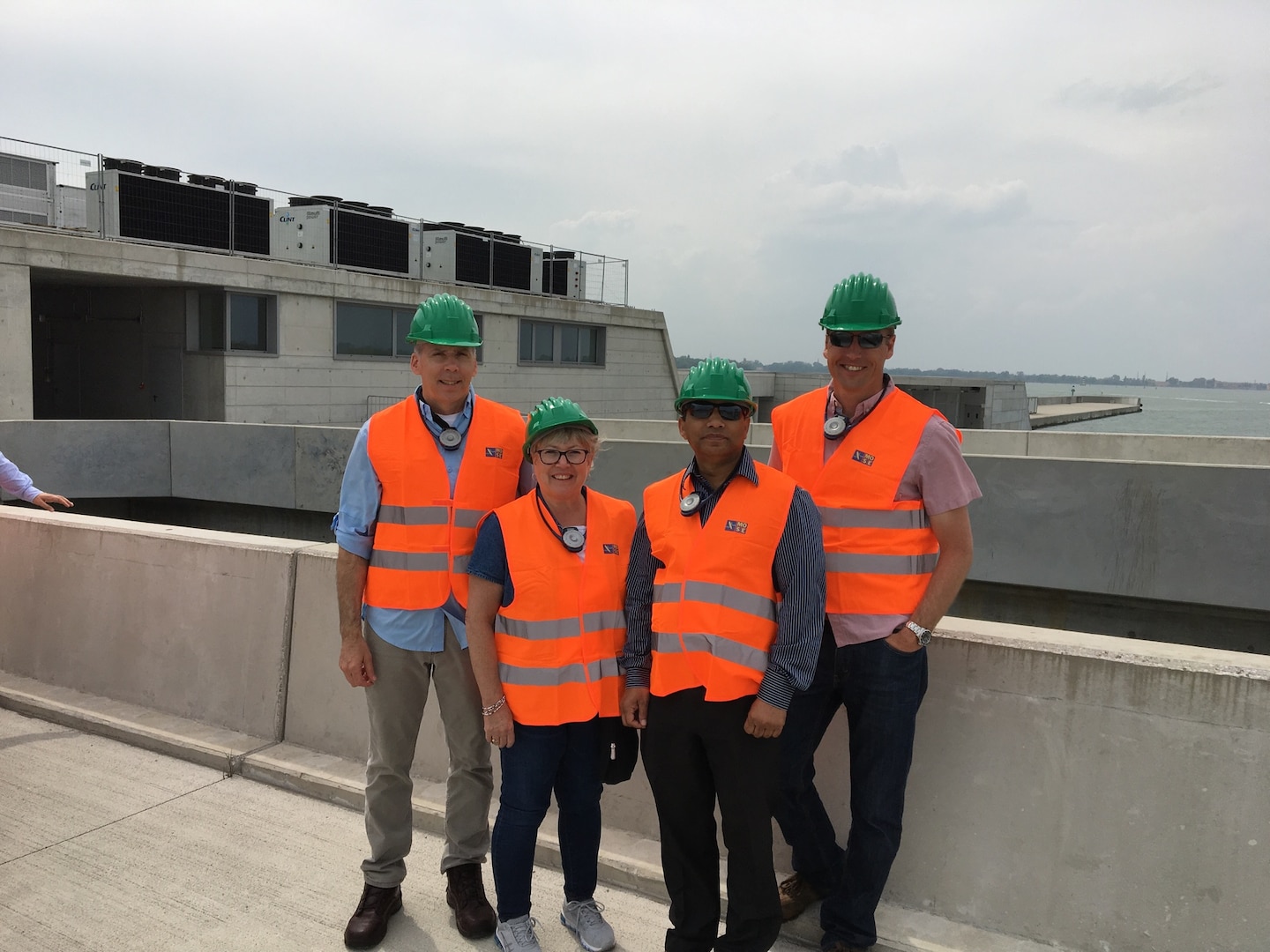 VENICE, Italy (June 6, 2019)—During the Annual Meeting of the I-STORM Network on June 6-7 2019 in Venice Italy members of the Project Management team for the Coastal Texas Protection and Restoration Feasibility Study at USACE Galveston District tour the MOSE Barrier at Lido Barrier Inlet, a system of mobile gates installed at the lagoon inlets that are able to temporarily isolate the Venetian lagoon from the Adriatic Sea during severe storm surge events, thus ensuring acceptable safeguarding water levels. (left to right)Tom Smith, Sharon Tirpak, Himangshu Das, and John Winkelman. (Photo provided by Sharon Tirpak)