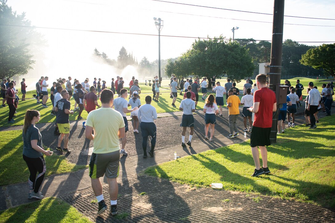 Members of Team Yokota participated in a 5K run during Purple Heart Day at Yokota Air Base, Japan, Aug. 7, 2019.
