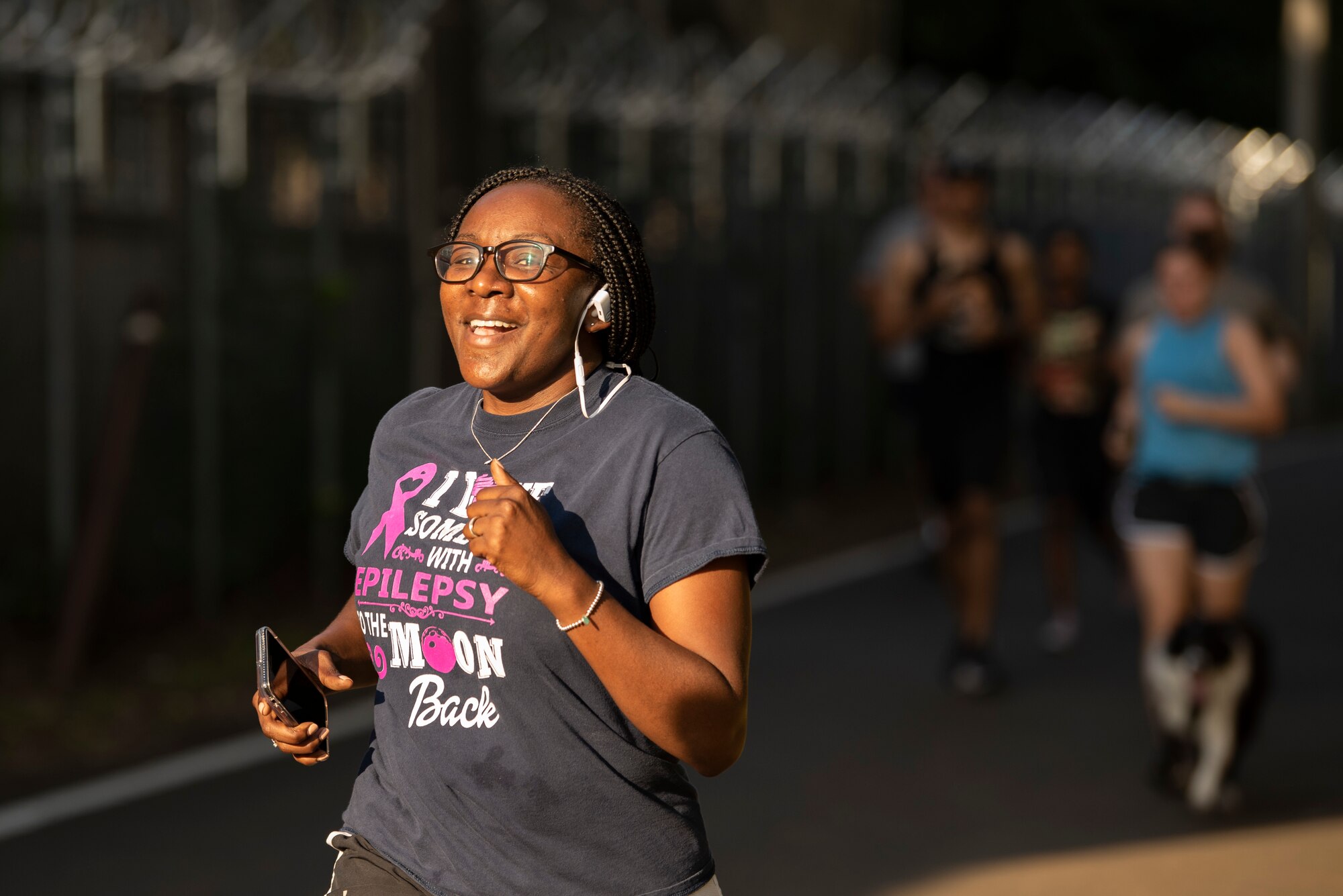 Master Sgt. Tiffany Bufford, 374th Safety Office superintendent, runs a 5K during Purple Heart Day at Yokota Air Base, Japan, Aug. 7, 2019.