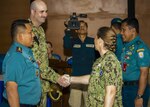 JAVA SEA (August 7, 2019) Senior U.S. and Indonesian Navy delegations formerly greet each other during the closing ceremony of Cooperation Afloat Readiness and Training (CARAT) Indonesia 2019. CARAT, the U.S. Navy's longest running regional exercise in South and Southeast Asia, strengthens partnerships between regional navies and enhances maritime security cooperation throughout the Indo-Pacific.