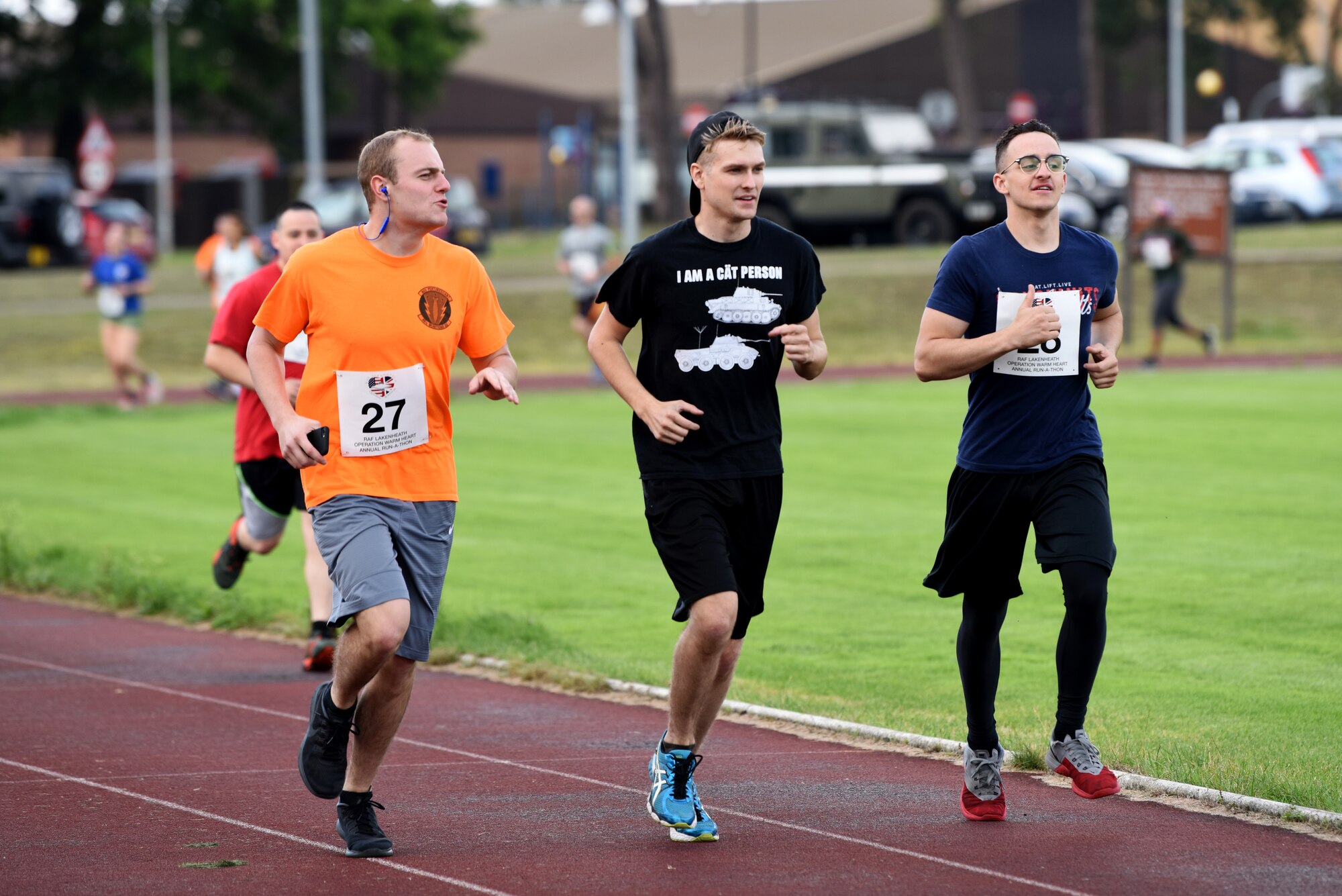 Liberty Wing Airmen participate in the Operation Warm Heart run-a-thon at Royal Air Force Lakenheath, England, August 2, 2019. OWH is a non-profit organization led by the Lakenheath First Sergeant Council that raises money for Airmen and the community. (U.S. Air Force photo by Airman 1st Class Madeline Herzog)