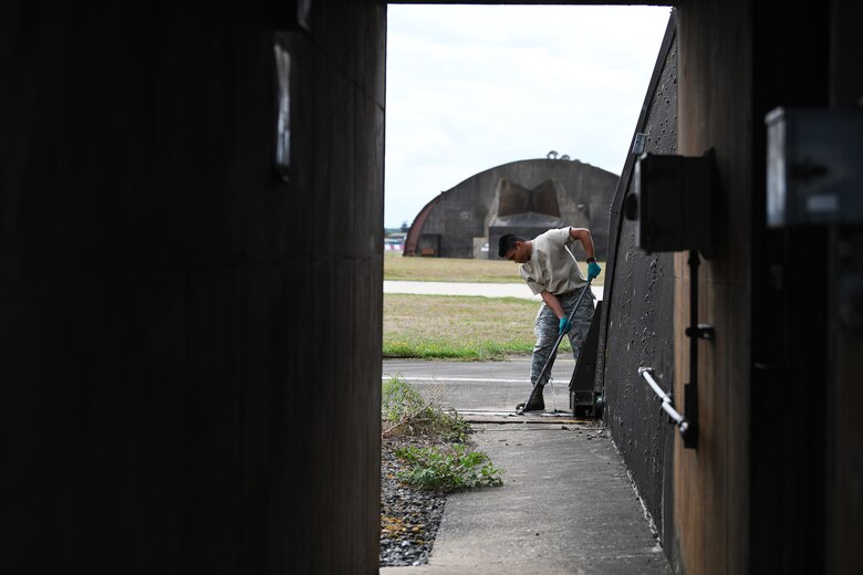 U.S. Air Force Senior Airman Matthew Bonjoe Rosario, 48th Civil Engineer Squadron structural apprentice, prepares a protected aircraft shelter for maintenance at Royal Air Force Lakenheath, England, Aug. 7, 2019. A PAS is necessary to house aircraft during inclement weather allowing maintenance personnel the ability to service the aircraft through adverse conditions. (U.S. Air Force photo by Airman 1st Class Shanice Williams-Jones)