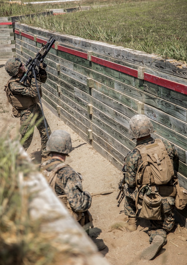 U.S. Marine Pfc. Dustin Davis, an infantryman with India Company, 3rd Battalion, 23rd Marines, 4th Marine Division fires an M203 grenade launcher during live-fire and maneuver training at Fort Knox, Kentucky., Aug. 5, 2019.  The annual training for 3/23 is focused on squad-level, offensive and defensive operations and tactics to strengthen the Marine Forces Reserve component, ultimately strengthening the Marine Corps’ Total Force. (U.S. Marine Corps photo by Cpl. Tessa D. Watts)