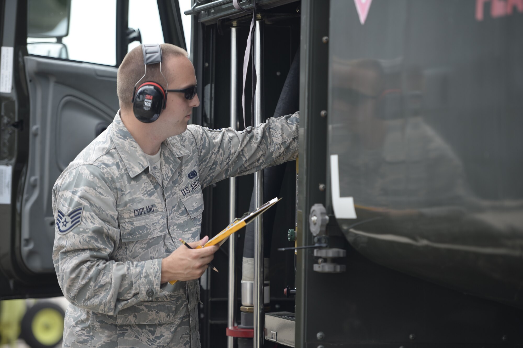 U.S. Air Force Staff Sgt. Andrew Copland, a fuels specialist with the 133rd Petroleum, Oil and Lubricants Flight, completes a fuel transaction form which account for fuel movement in St. Paul, Minn., July 18, 2019.
