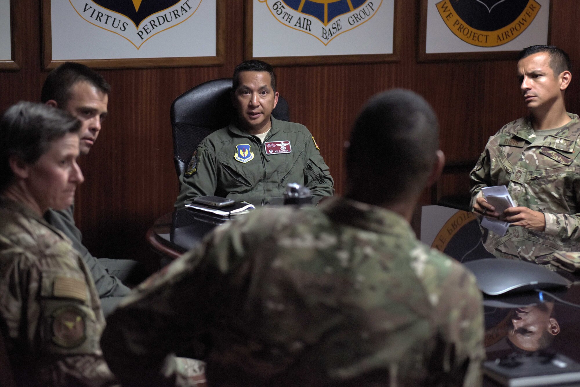 Col. Troy Pananon, 100th Air Refueling Wing commander, meets with Airmen of the 496th Air Base Squadron, at Moron Air Base, Spain, Aug. 6, 2019. Pananon met with the installation commander, inspected the dorms and recognized several top performers for outstanding achievements during his visit. (U.S. Air Force photo by Senior Airman Benjamin Cooper)