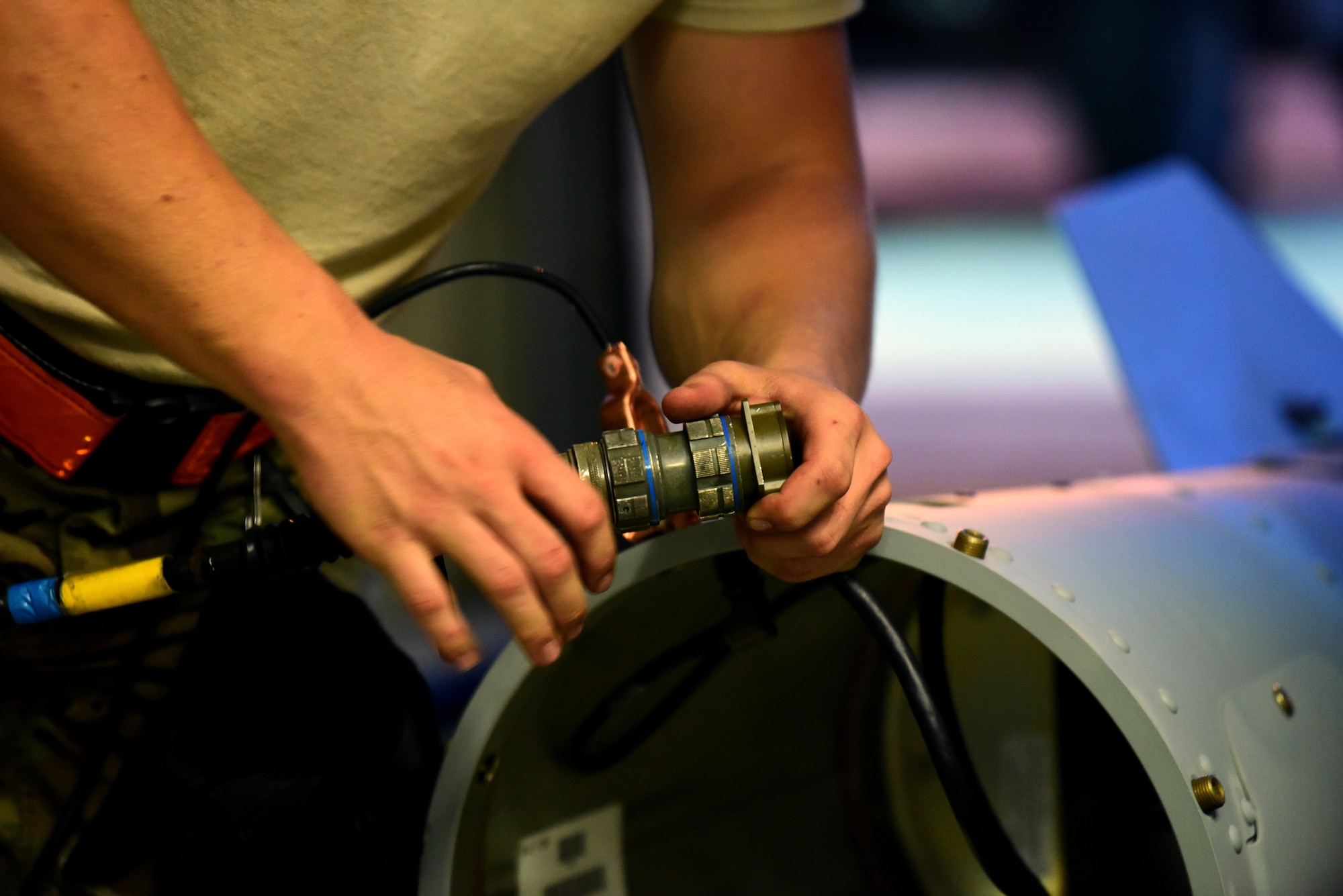 Airmen test fins for the most up to date software before attaching them to munitions during Combat Ammunition Production Exercise 2019 on Aug. 7, 2019, at Aviano Air Base, Italy. Having the most up to date software ensures proper functionality of the fins allowing them to guide the munition. (U.S. Air Force photo by Airman 1st Class Caleb House)