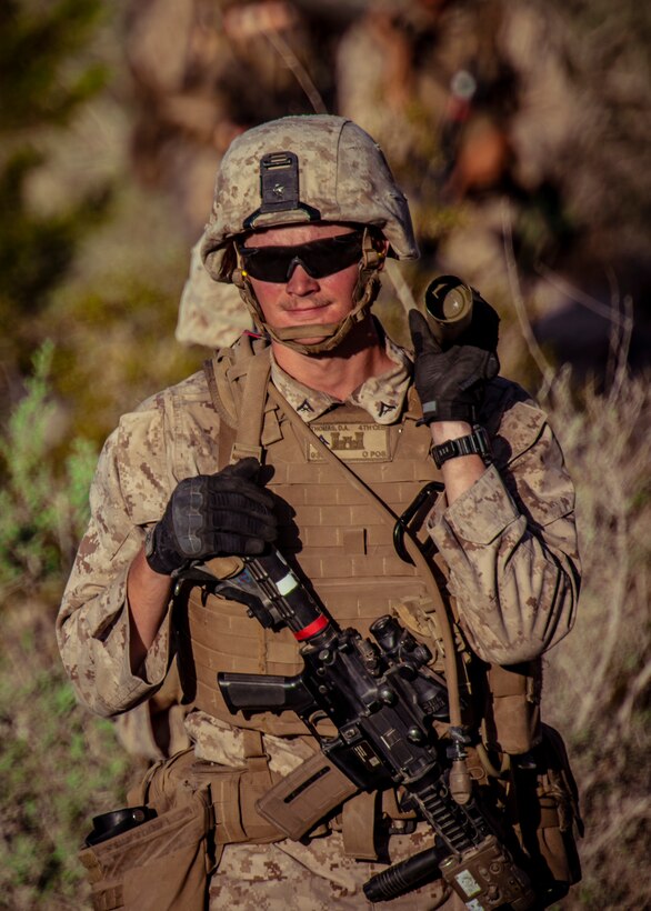 A U.S. Marine with 1st Battalion, 25th Marine Regiment, 4th Marine Division, hikes towards an objective at Range 400 during Integrated Training Exercise 5-19 at Marine Corps Air Ground Combat Center Twentynine Palms, Calif., Aug. 5, 2019. Reserve Marines with 1/25 participate in ITX to prepare for their upcoming deployment to the Pacific Region. (U.S. Marine Corps photo by Lance Cpl. Jose Gonzalez)