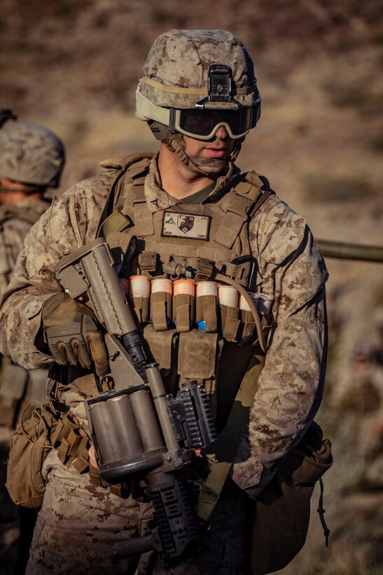 A U.S. Marine with 1st Battalion, 25th Marine Regiment, 4th Marine Division, prepares to rush an objective at Range 400 during Integrated Training Exercise 5-19 at Marine Corps Air Ground Combat Center Twentynine Palms, Calif., Aug. 5, 2019. Reserve Marines with 1/25 participate in ITX to prepare for their upcoming deployment to the Pacific Region. (U.S. Marine Corps photo by Lance Cpl. Jose Gonzalez)