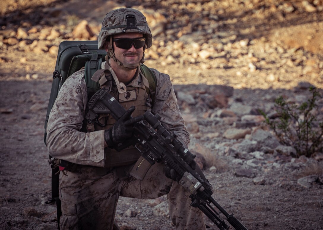 A U.S. Marine with 1st Battalion, 25th Marine Regiment, 4th Marine Division, prepares to rush an objective at Range 400 during Integrated Training Exercise 5-19 at Marine Corps Air Ground Combat Center Twentynine Palms, Calif., Aug. 5, 2019. Reserve Marines with 1/25 participate in ITX to prepare for their upcoming deployment to the Pacific Region. (U.S. Marine Corps photo by Lance Cpl. Jose Gonzalez)