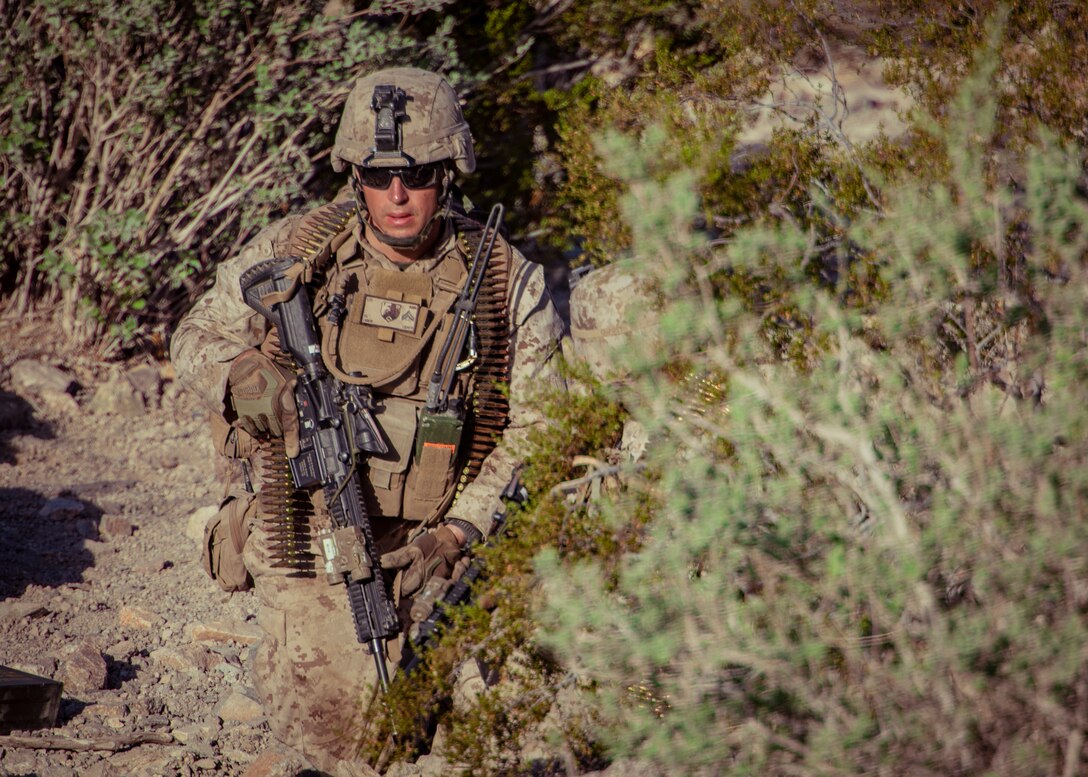 A U.S. Marine with 1st Battalion, 25th Marine Regiment, 4th Marine Division, prepares to rush an objective at Range 400 during Integrated Training Exercise 5-19 at Marine Corps Air Ground Combat Center Twentynine Palms, Calif., Aug. 5, 2019. Reserve Marines with 1/25 participate in ITX to prepare for their upcoming deployment to the Pacific Region. (U.S. Marine Corps photo by Lance Cpl. Jose Gonzalez)