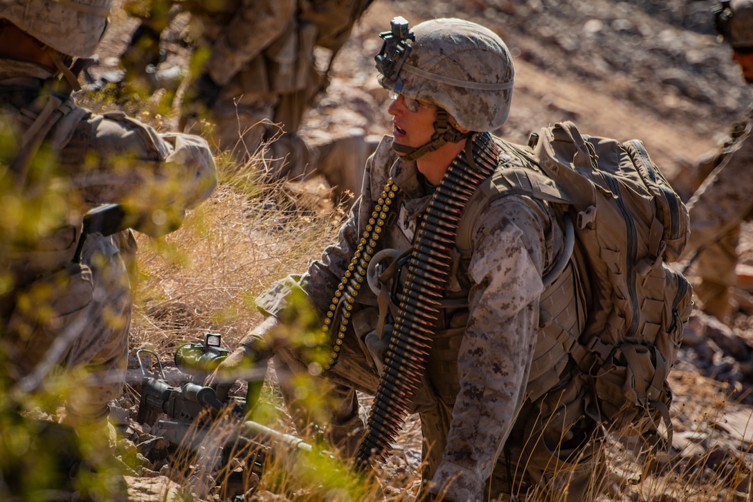 A U.S. Marine with 1st Battalion, 25th Marine Regiment, 4th Marine Division, prepares to rush an objective at Range 400 during Integrated Training Exercise 5-19 at Marine Corps Air Ground Combat Center Twentynine Palms, Calif., Aug. 5, 2019. Reserve Marines with 1/25 participate in ITX to prepare for their upcoming deployment to the Pacific Region. (U.S. Marine Corps photo by Lance Cpl. Jose Gonzalez)