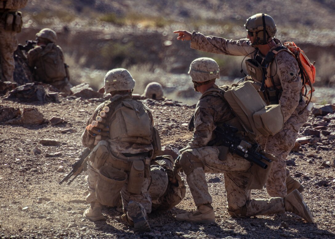U.S. Marines with 1st Battalion, 25th Marine Regiment, 4th Marine Division, prepare to drag a simulated casualty at Range 400 during Integrated Training Exercise 5-19 at Marine Corps Air Ground Combat Center Twentynine Palms, Calif., Aug. 5, 2019. Reserve Marines with 1/25 participate in ITX to prepare for their upcoming deployment to the Pacific Region. (U.S. Marine Corps photo by Lance Cpl. Jose Gonzalez)