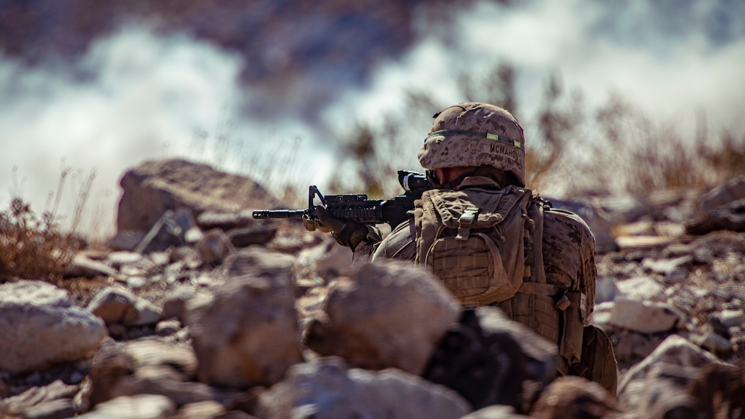 A U.S. Marine with 1st Battalion, 25th Marine Regiment, 4th Marine Division, engages simulated hostiles at Range 400 during Integrated Training Exercise 5-19 at Marine Corps Air Ground Combat Center Twentynine Palms, Calif., Aug. 5, 2019. Reserve Marines with 1/25 participate in ITX to prepare for their upcoming deployment to the Pacific Region. (U.S. Marine Corps photo by Lance Cpl. Jose Gonzalez)