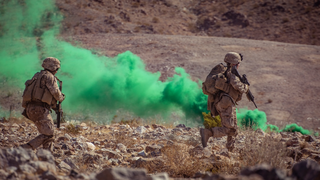 U.S. Marines with 1st Battalion, 25th Marine Regiment, 4th Marine Division, rush towards their next objective at Range 400 during Integrated Training Exercise 5-19 at Marine Corps Air Ground Combat Center Twentynine Palms, Calif., Aug. 5, 2019. Reserve Marines with 1/25 participate in ITX to prepare for their upcoming deployment to the Pacific Region. (U.S. Marine Corps photo by Lance Cpl. Jose Gonzalez)