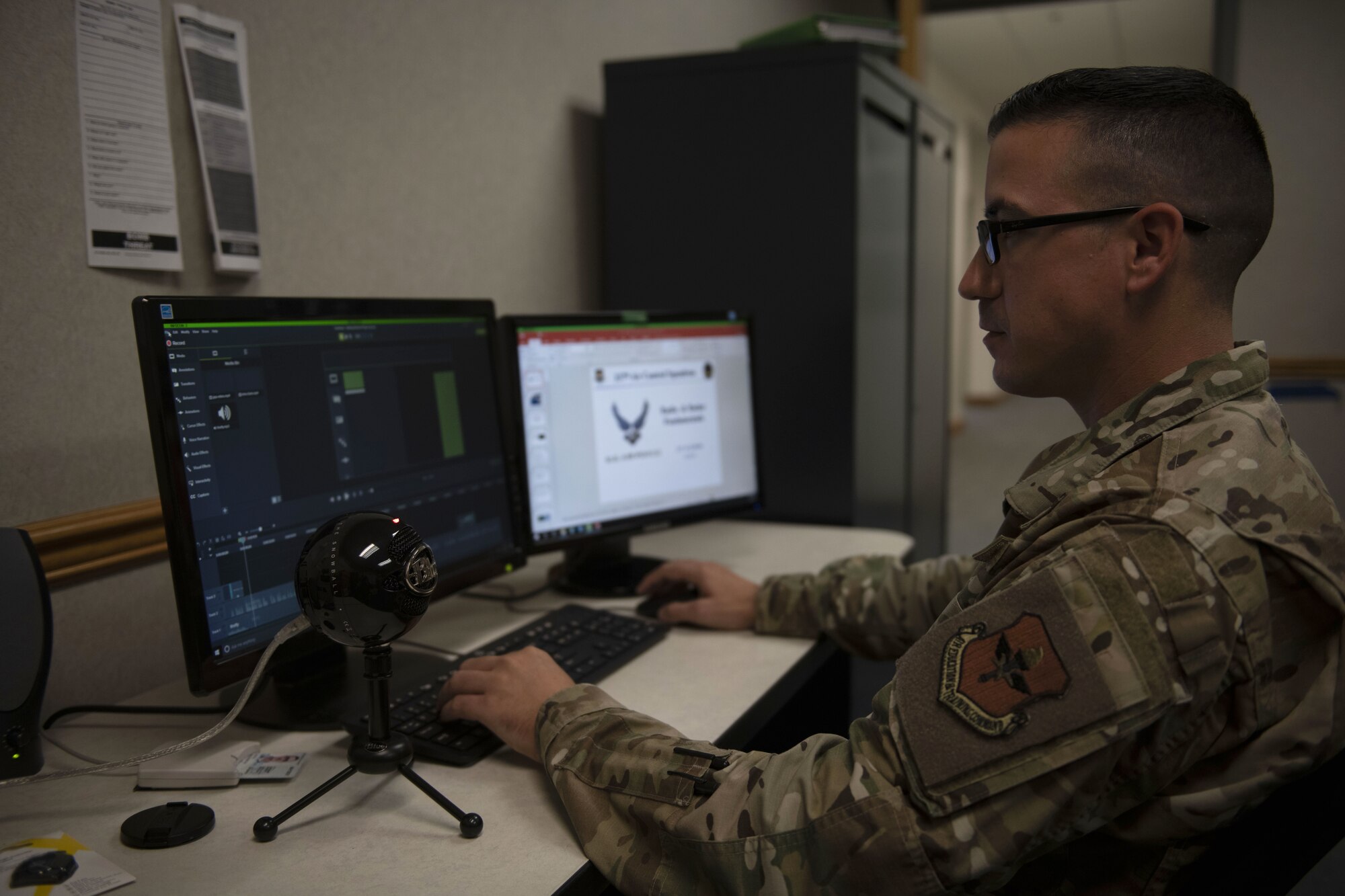 U.S. Air Force Maj. Anthony Keith, Undergraduate ABM Course instructor, edits a lesson to upload online for students at Tyndall Air Force Base, Florida Aug. 6, 2019. The instructors spent hours recording and editing each lesson for students to have a unique learning format for the course. (U.S. Air Force photo by Airman 1st Class Heather Leveille)