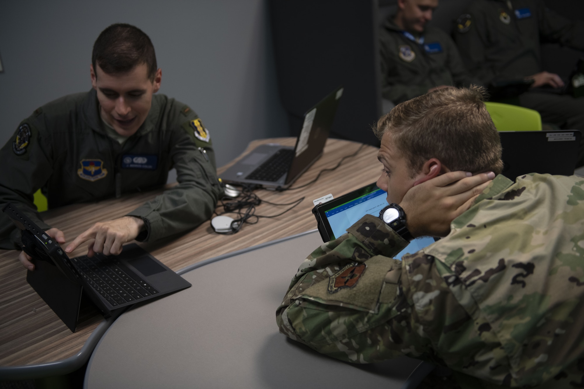 Undergraduate ABM Course students study material at Tyndall Air Force Base, Florida, Aug. 6, 2019. Students are given more freedom to study outside of the classroom by using tablets. (U.S. Air Force photo by Airman 1st Class Heather Leveille)