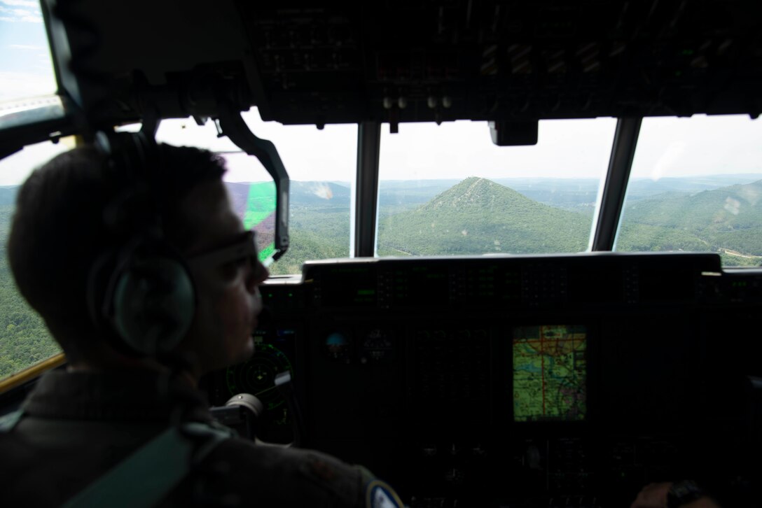 Maj. Seth Lake, 327th Airlift Squadron pilot, and Maj. Matthew Heisel, 327th Airlift Squadron pilot, participate in a training flight to enhance readiness on August 3, 2019, at Little Rock Air Force Base, Ark. The majority of our Reserve members have to meet the same requirements of Active Duty personnel. This means they have to balance a fulltime civilian job or college studies while maintaining their military readiness. The airspace, terrain, drop zones, landing zones, and local airports here in Arkansas are excellent venues for training and the relationship the base has with Arkansas affords the resources to execute the mission. (U.S. Air Force photo by Senior Airman Chase Cannon)