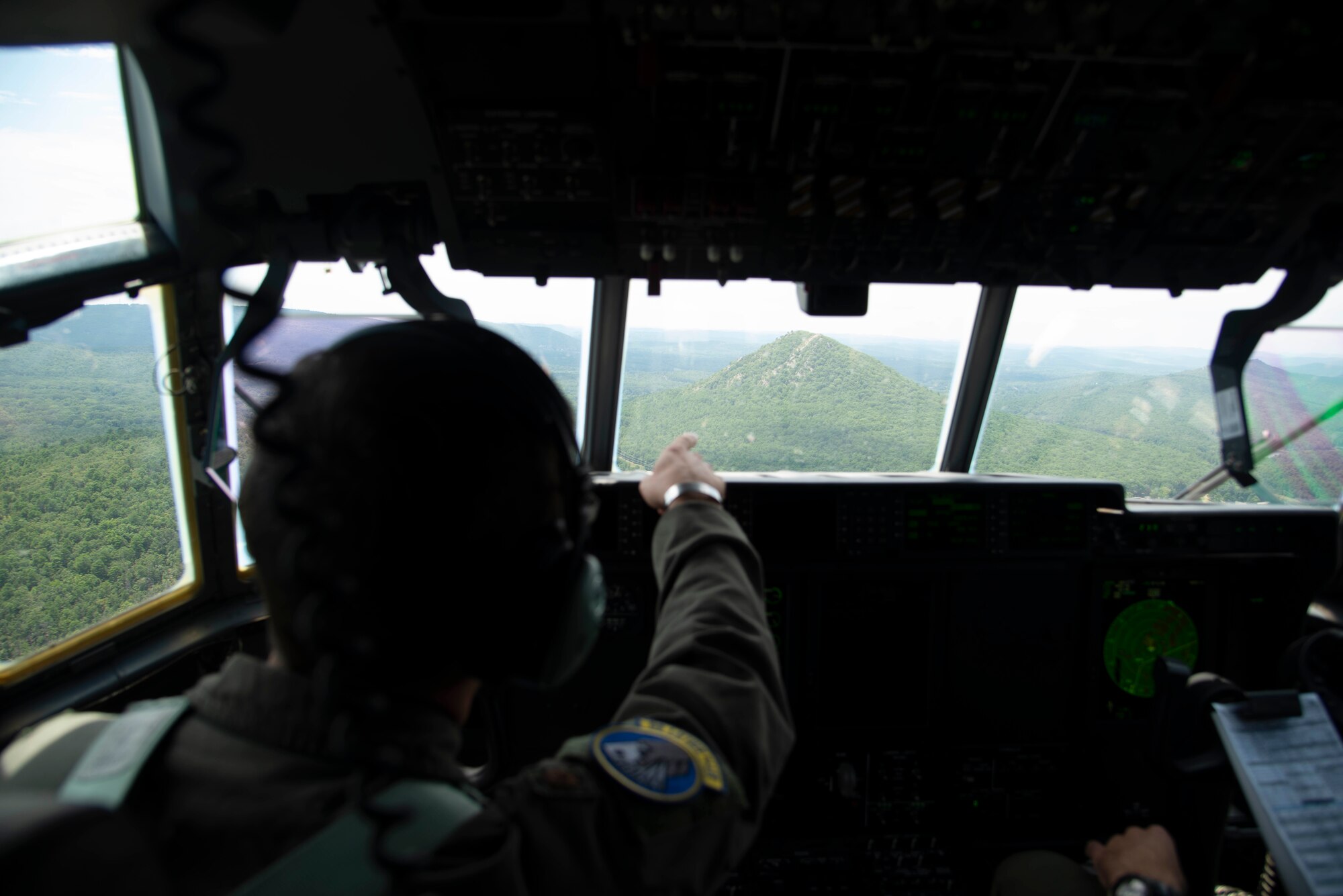 Maj. Seth Lake, 327th Airlift Squadron pilot, and Maj. Matthew Heisel, 327th Airlift Squadron pilot, participate in a training flight to enhance readiness on August 3, 2019, at Little Rock Air Force Base, Ark. The majority of our Reserve members have to meet the same requirements of Active Duty personnel. This means they have to balance a fulltime civilian job or college studies while maintaining their military readiness. The airspace, terrain, drop zones, landing zones, and local airports here in Arkansas are excellent venues for training and the relationship the base has with Arkansas affords the resources to execute the mission. (U.S. Air Force photo by Senior Airman Chase Cannon)
