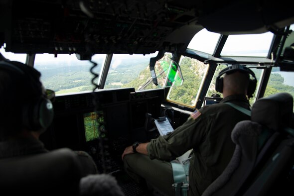 Maj. Seth Lake, 327th Airlift Squadron pilot, and Maj. Maj. Matthew Heisel, 327th Airlift Squadron pilot, participate in a training flight to enhance readiness on August 3, 2019, at Little Rock Air Force Base, Ark. Mobility aircraft, such as the C-130J, deliver critical personnel and cargo and provide airdrop of time-sensitive supplies, food and ammunition on a global scale with a critical part of the airlift capabilities being the efforts of the maintenance personnel who ensure the workhorse of the mobility for, the C-130, is always ready, always there! (U.S. Air Force photo by Senior Airman Chase Cannon)