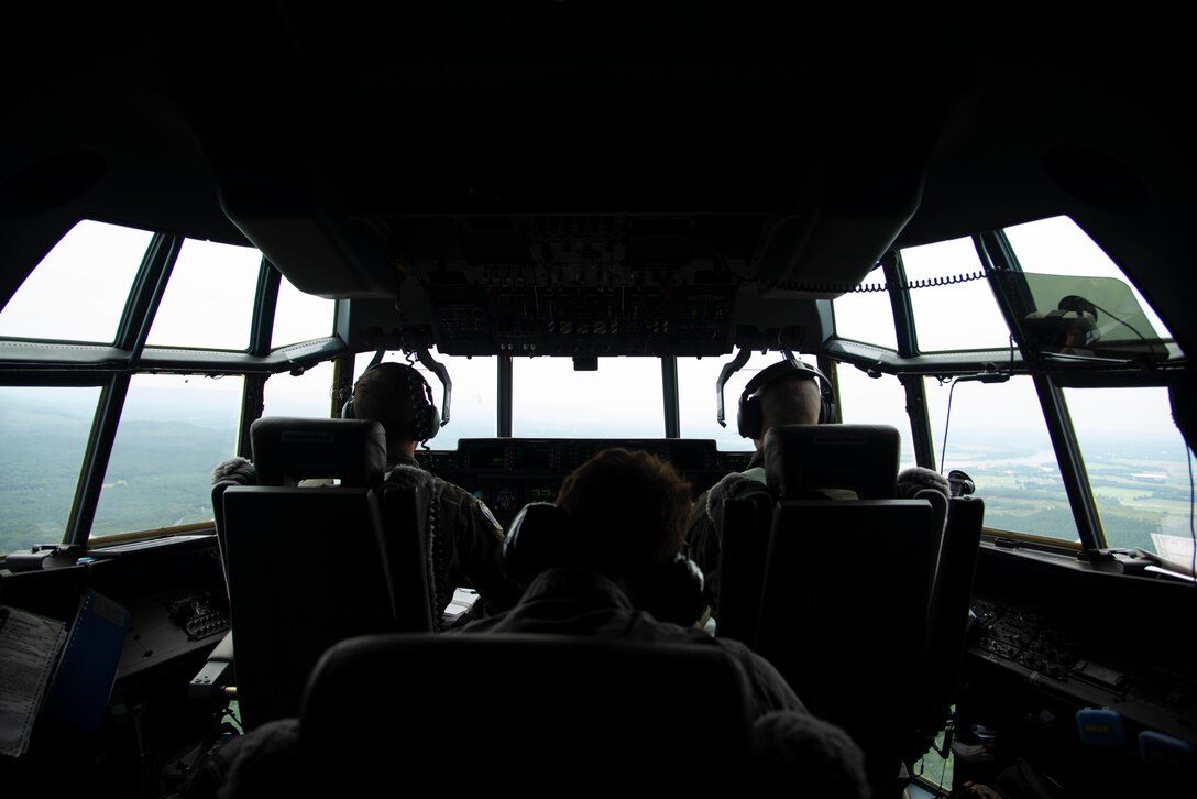 Maj. Seth Lake, 327th Airlift Squadron pilot, and Maj. Matthew Heisel, 327th Airlift Squadron pilot, participate in a training flight to enhance readiness on August 3, 2019, at Little Rock Air Force Base, Ark. The majority of our Reserve members have to meet the same requirements of Active Duty personnel. This means they have to balance a fulltime civilian job or college studies while maintaining their military readiness. The airspace, terrain, drop zones, landing zones, and local airports here in Arkansas are excellent venues for training and the relationship the base has with Arkansas affords the resources to execute the mission. (U.S. Air Force photo by Senior Airman Chase Cannon)