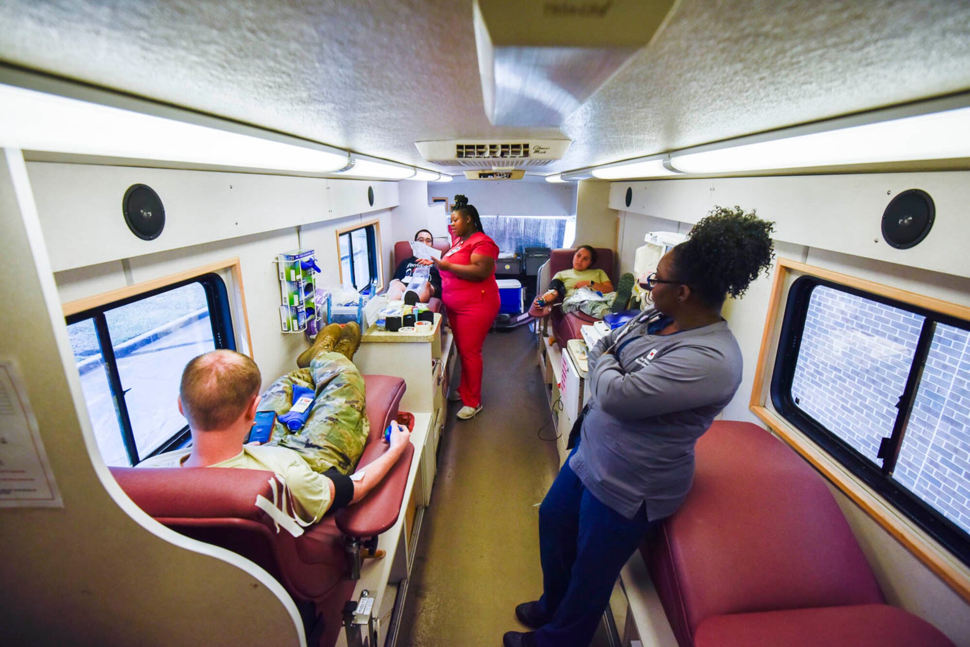 Airmen from Team Little Rock donate blood and blood platelets during a blood drive held on August 4, 2019, at Little Rock Air Force Base, Ark. The blood drive was a chance for the Airmen to take a break from readiness training to give back to the community. Without volunteer blood donors, Arkansas Blood Institute could not adequately serve patients and hospitals in the community. (U.S. Air Force photo by Senior Airman Nathan Byrnes)