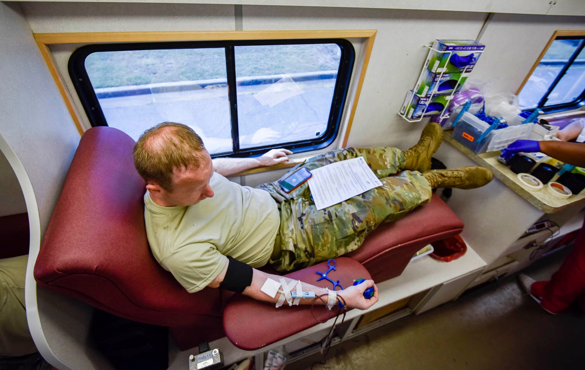 An Airman participates in a blood drive conducted by the Arkansas Blood Institute at Little Rock Air Force Base, Ark., August 4, 2019. The Arkansas Blood Institute is a non-profit blood center whose volunteer donors provide every drop of blood needed by patients in 40 Arkansas hospitals. The number one reason donors say they give blood is because they “want to help others.” (U.S. Air Force photo by Senior Airman Byrnes)