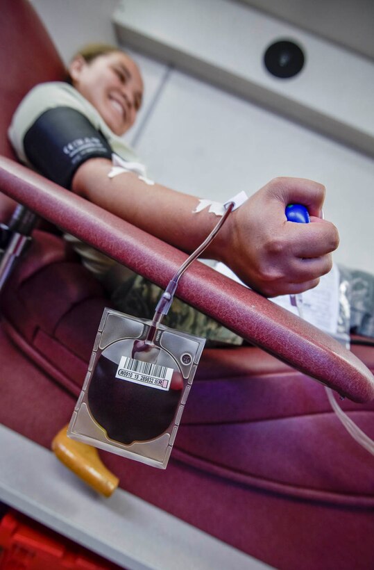 Team Little Rock Airmen donate blood and blood platelets during a blood drive held on August 4, 2019, at Little Rock Air Force Base, Ark. In order to extract platelets, specialists use apheresis machines to draw blood and return the unused portions of the donor. Platelets are tiny cells in the body that form clots and stop bleeding. They are essential to surviving traumatic injuries. Platelets must be used within five days and new donors are needed every day. (U.S. Air Force photo by Senior Airman Nathan Byrnes)