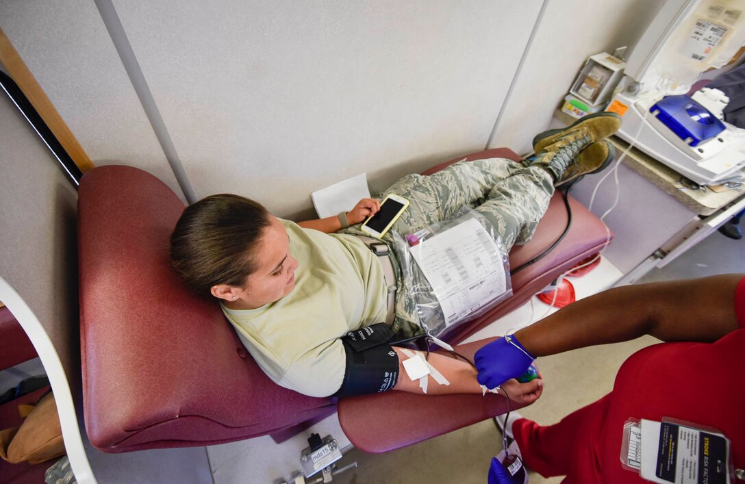 Team Little Rock Airmen donate blood and blood platelets during a blood drive held on August 4, 2019, at Little Rock Air Force Base, Ark. In order to extract platelets, specialists use apheresis machines to draw blood and return the unused portions of the donor. Platelets are tiny cells in the body that form clots and stop bleeding. They are essential to surviving traumatic injuries. Platelets must be used within five days and new donors are needed every day. (U.S. Air Force photo by Senior Airman Nathan Byrnes)