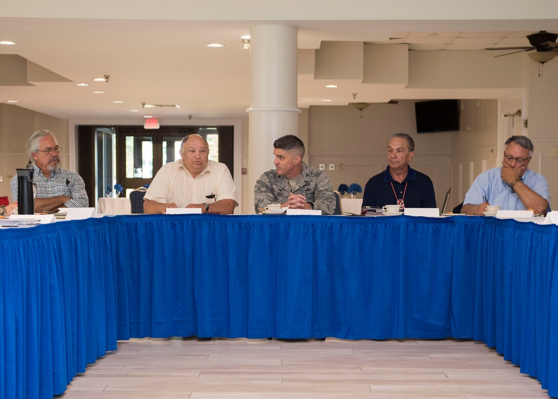 U.S. Air Force Col. Clinton Ross, 633rd Air Base Wing commander (center), sits with local Native American group representatives during a tribe consultation tour at Fort Eustis, Virginia, Aug. 7, 2019.