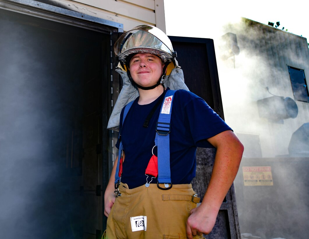 Tristen Jolley, Fire Explorer Program cadet, poses for a photo on Joint Base Andrews Md., July 27, 2019. Cadets learned life-saving skills meant to empower them to confidently respond to emergency situations