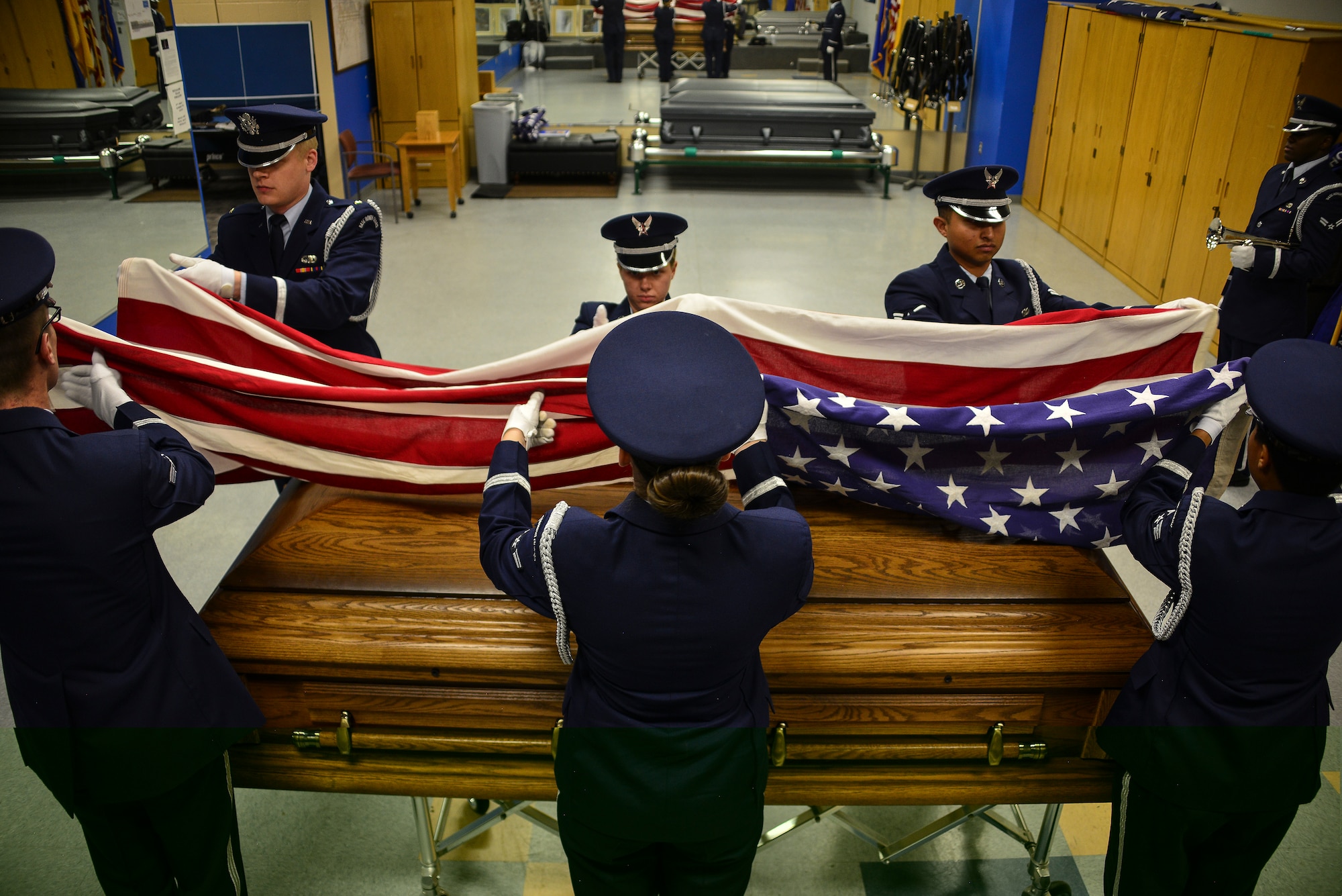 Members of the Kirtland Air Force Base Honor Guard Delta flight practice a seven member funeral ceremony.