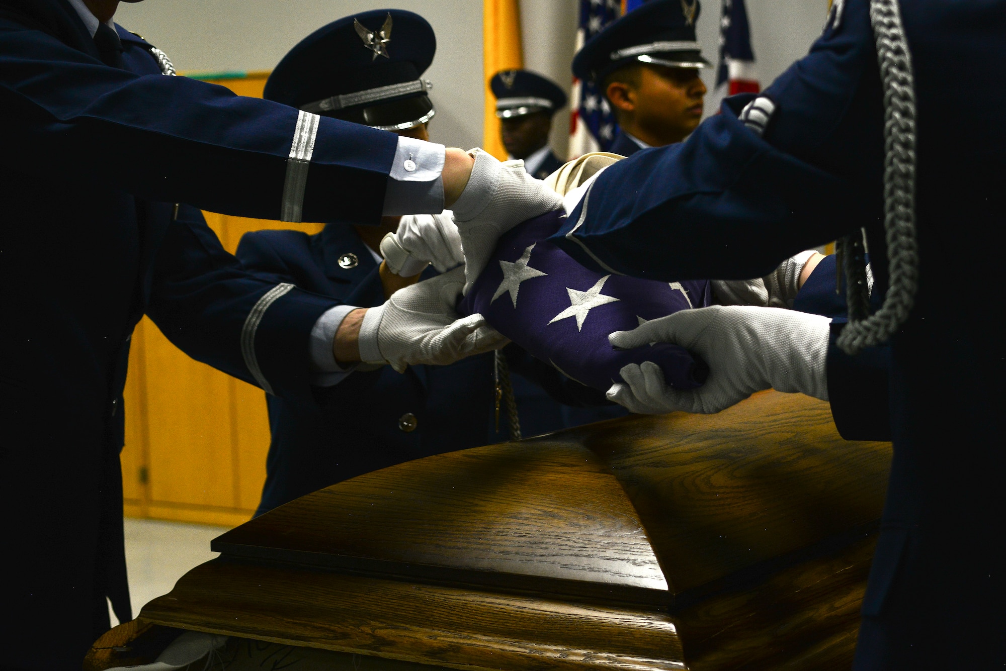 Members of the Kirtland Air Force Base Honor Guard Delta flight practice a seven member funeral ceremony.